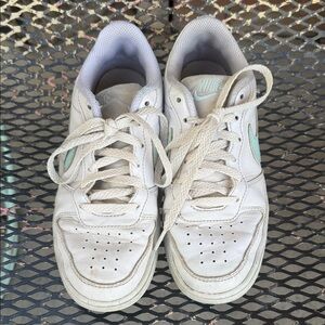 Nike White Sneakers with Mint Swoosh Accent